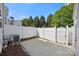 Fenced backyard, concrete patio, some mulch, and air conditioning unit at 4100 B Christine Ln, Waxhaw, NC 28173
