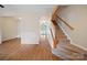 Open foyer with hardwood floors and staircase leading to the upper level at 4100 B Christine Ln, Waxhaw, NC 28173