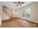 Inviting living room featuring hardwood floors, staircase and double door entry at 4100 B Christine Ln, Waxhaw, NC 28173