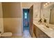 A classic bathroom boasts tiled walls, marble floors, and a separate toilet and shower area at 413 N Mulberry St, Cherryville, NC 28021