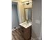 Bathroom showcasing a single vanity with a wooden cabinet at 423 S Rhyne St, Dallas, NC 28034