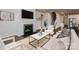 Bright living room featuring a cozy fireplace, hardwood floors, and modern decor at 431 Bent Burr Crk, York, SC 29745