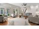 Spacious living room with abundant natural light, multiple sofas and a decorative rug at 4429 Cameron Oaks Dr, Charlotte, NC 28211