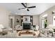 Cozy living room with fireplace, comfortable seating, and elegant decor at 4429 Cameron Oaks Dr, Charlotte, NC 28211