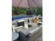 Relaxing outdoor living space featuring comfortable seating and a view of the refreshing pool at 504 Johnsfield Rd, Shelby, NC 28150