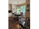 Cozy breakfast nook with a chandelier, hardwood floors, and natural light, great for Gathering meals at 504 Johnsfield Rd, Shelby, NC 28150