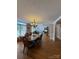 Open-concept dining room and living room with hardwood floors and natural light at 504 Johnsfield Rd, Shelby, NC 28150