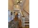 Elegant foyer features staircase, chandelier, and a balcony overlooking the entrance at 504 Johnsfield Rd, Shelby, NC 28150