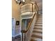 Open foyer featuring hardwood floors, a staircase with white railings, and a view of the second floor at 504 Johnsfield Rd, Shelby, NC 28150