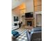 Bright living room boasts a fireplace, high ceilings, and access to the second-floor balcony at 504 Johnsfield Rd, Shelby, NC 28150