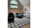 Well-lit living room with a large window, comfortable seating, and an open layout at 504 Johnsfield Rd, Shelby, NC 28150