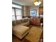 Inviting office space with a comfortable sofa, built-in storage, and a large window at 504 Johnsfield Rd, Shelby, NC 28150