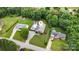 Charming home with a backyard oasis featuring a sparkling pool and lush landscaping at 5252 Ramblewoods Ave, Claremont, NC 28610