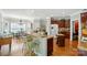 Gourmet kitchen with breakfast bar, granite countertops, stainless steel appliances, and ample cabinet space at 5718 Bardsey Ct, Matthews, NC 28104