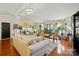 Spacious living room featuring hardwood floors, a fireplace, and neutral decor at 6221 Thermal Rd, Charlotte, NC 28211