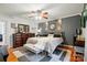 Spacious main bedroom featuring a large bed, dresser, mirror, and area rug at 6221 Thermal Rd, Charlotte, NC 28211
