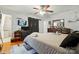 Cozy main bedroom with TV, dresser, closet, and full bathroom at 6221 Thermal Rd, Charlotte, NC 28211