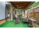Outdoor patio featuring outdoor furniture, grill, and well manicured greenery at 6221 Thermal Rd, Charlotte, NC 28211