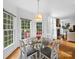 Cozy breakfast nook with windows and view of deck at 7006 Olde Sycamore Dr, Mint Hill, NC 28227