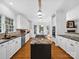 Open kitchen with granite countertops and stainless steel appliances at 7006 Olde Sycamore Dr, Mint Hill, NC 28227