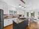 Bright kitchen with granite countertops and stainless steel appliances at 7006 Olde Sycamore Dr, Mint Hill, NC 28227