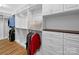 Bright walk-in closet boasts ample storage and custom organization at 7006 Olde Sycamore Dr, Mint Hill, NC 28227