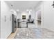 Modern kitchen featuring stainless steel appliances, white cabinetry, and granite countertops at 7416 Cross Tie Ct, Mint Hill, NC 28227