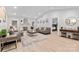 Bright living room with a fireplace, vaulted ceilings, recessed lights and hardwood floors at 7416 Cross Tie Ct, Mint Hill, NC 28227