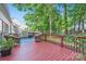Relaxing back deck featuring outdoor furniture and a view of the backyard at 7600 Ridgefield Dr, Charlotte, NC 28269