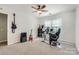 Study featuring computer, instruments and office chair with great lighting at 7600 Ridgefield Dr, Charlotte, NC 28269