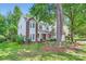 Picturesque two-story home with brick accents, bay window, and a welcoming front porch at 7600 Ridgefield Dr, Charlotte, NC 28269