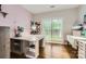 Bright office with hardwood floors, a large window, and ample workspace at 7600 Ridgefield Dr, Charlotte, NC 28269