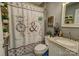 Cozy bathroom with decorative shower curtain and granite sink at 800 Sunset Rd, Cherryville, NC 28021