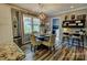 Eat-in kitchen dining area featuring wood floors and seating at the bar at 800 Sunset Rd, Cherryville, NC 28021