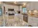 Modern kitchen with granite countertops, stainless steel appliances, and white cabinetry at 800 Sunset Rd, Cherryville, NC 28021