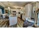 Beautiful kitchen with white cabinets, granite countertops, stainless appliances, and eat-in dining area at 800 Sunset Rd, Cherryville, NC 28021