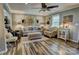 Inviting living area with a cozy seating arrangement, wood floors, and ample lighting at 800 Sunset Rd, Cherryville, NC 28021