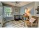 A sun-filled living room featuring a window and wood-style flooring, perfect for relaxation and comfort at 800 Sunset Rd, Cherryville, NC 28021