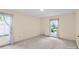 Bedroom featuring carpet, bright walls and windows with patterned curtains at 8017 Prince George Rd, Charlotte, NC 28210