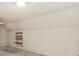 Bright bedroom featuring a built-in shelf and neutral colored walls at 8017 Prince George Rd, Charlotte, NC 28210