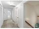 Hallway with multiple rooms and two closets at 8017 Prince George Rd, Charlotte, NC 28210