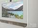 State-of-the-art CPI security system with wall-mounted display, offering views of serene landscapes at 8018 Saluda Dr, Charlotte, NC 28269