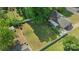 Aerial view showcases a spacious backyard, perfect for outdoor activities and relaxation, with garden boxes at 8206 Idlewild Rd # 22, Indian Trail, NC 28079