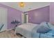 Charming bedroom with a comfortable bed, side table, and natural light, perfect for relaxation at 8206 Idlewild Rd # 22, Indian Trail, NC 28079