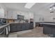 Spacious kitchen featuring two tone cabinets, modern appliances and a sun tunnel skylight at 8206 Idlewild Rd # 22, Indian Trail, NC 28079