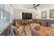 Inviting living room with stylish wood-look flooring, comfortable seating and lots of space at 8206 Idlewild Rd # 22, Indian Trail, NC 28079