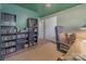 Home office features built in bookcases, a desk, and a comfortable rolling desk chair at 8206 Idlewild Rd # 22, Indian Trail, NC 28079