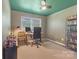 Home office with natural light, work space and carpeted floors at 8206 Idlewild Rd # 22, Indian Trail, NC 28079