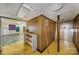 Unfinished basement area with wood paneling, painted floor, and utility access, ready for customization at 830 Cabaniss Dr, Shelby, NC 28150