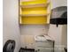 Bathroom area featuring shelves, sink, and towel dispenser at 830 Cabaniss Dr, Shelby, NC 28150